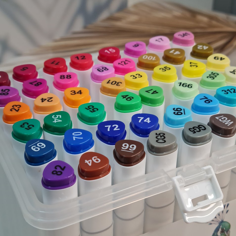 Usmile Toys art supplies: a 48-color marker pen set with bright and anime-inspired colors, featuring a peacock design on the packaging insert." www.usmile.tioys